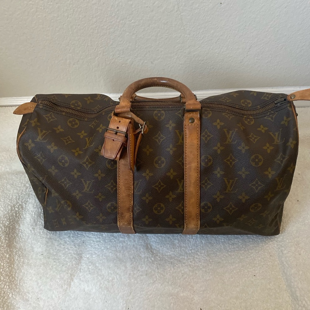 Louis Vuitton keepal travel bag 100% Authentic